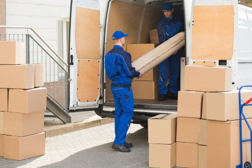 Office relocation planning in Harringay with boxes and workspace equipment