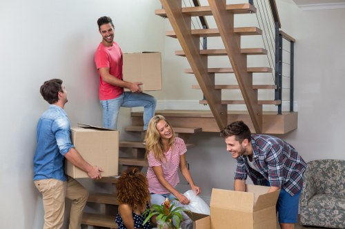 Packed boxes and furniture ready for local removals