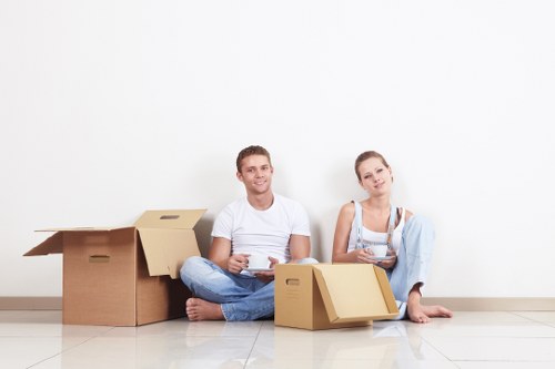 Removal team planning a local move in Harringay with boxes and furniture