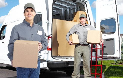 Local office move team handling furniture and office items in North London